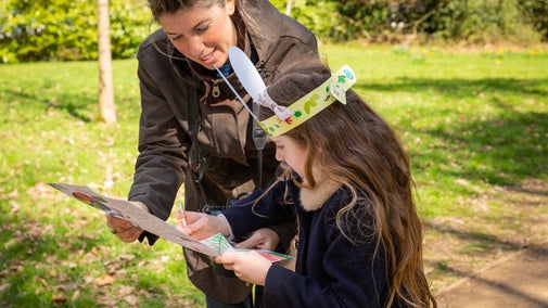 A family enjoying an Easter trail
